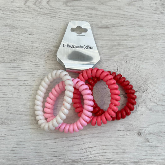Élastiques spirales roses